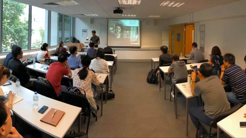 Giovanni presenting to a classroom at the University of Westminster, London